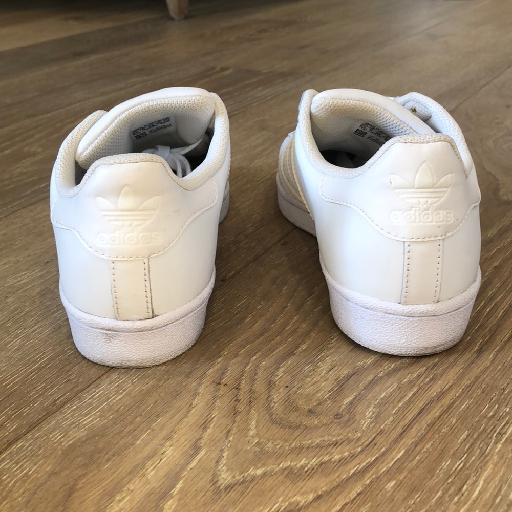 triple white adidas superstars